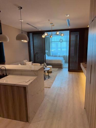 Beach & Coast Apartment | Beachfront studio holiday home