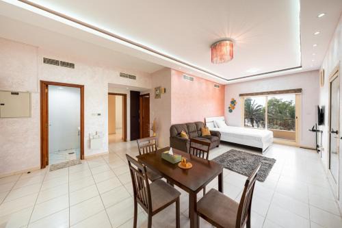 Al Hamra Village Apartment | Golfside Serenity - 2 King Beds - near Al Hamra Mall