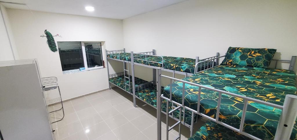 Al Majaz Hostel | Homely Hostel