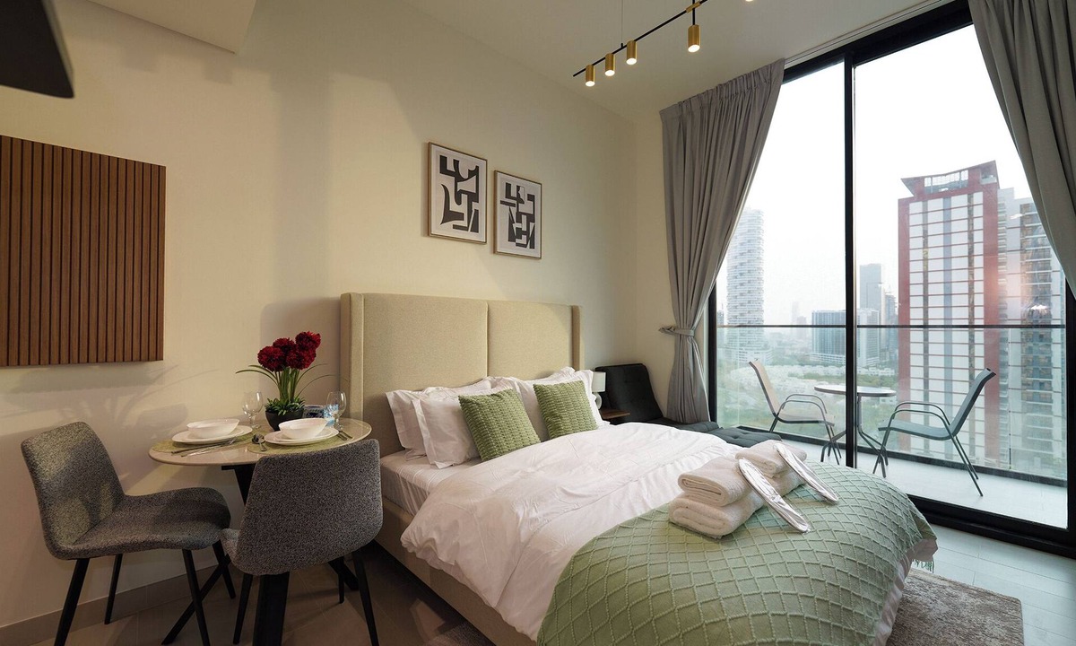 Jumeirah Village Circle Apartment | Modern Studio with Balcony Views of FIVE Hotels