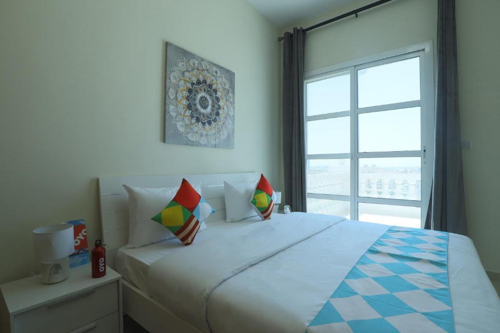 Dubai Production City Apartment | OYO 318 Home Qasr Sabah 3