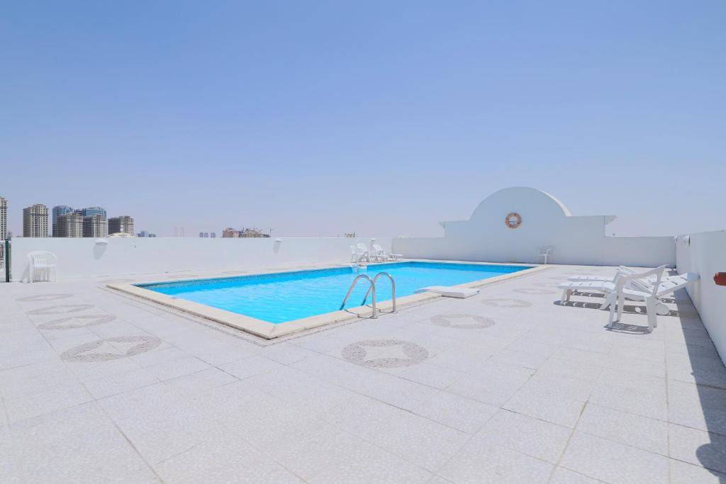 Dubai Production City Apartment | OYO Home 254 1BHK Qasr Sabah 3 IMPZ