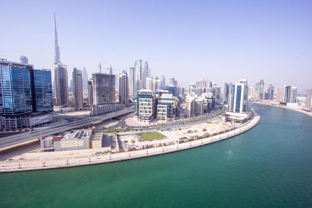 Business Bay Apartment | Spacious High-Floor 2BR Apartment with Full Burj Khalifa & Dubai Canal View