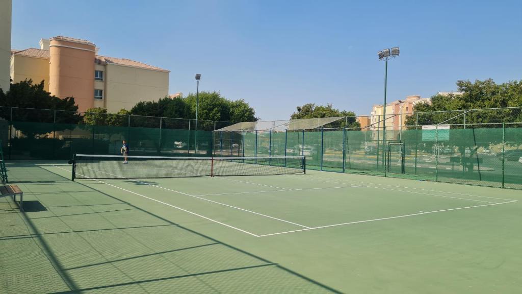 Discovery Gardens Apartment | Studio with free Tennis court at the yard