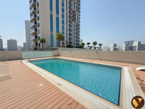 Jumeirah Village Circle Apartment | Vogue One Bedroom Apartment with balcony, access to amazing Pool, Kids Area, located Jumeirah Village Circle JVC