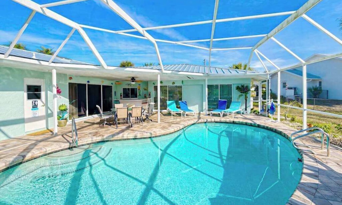 Sorrento Shores House | Waterfront home with pool dock accessible to Gulf dog friendly with AC & WD