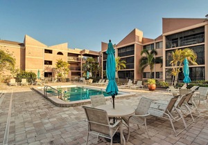 Quiet First-Floor Condo w/ Marina View & Pool