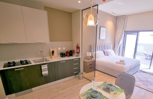 Jumeirah Village Apartment | Amazing stay Park View - Superior Studio balcony