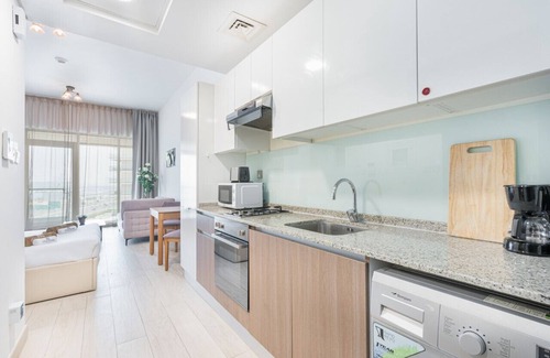 Jadaf Apartment | Elegant Home in Al Jaddaf with Roof Top Pool