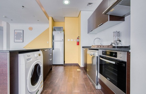 Dubai Sports City Apartment | Homely 1BR at The Matrix Dubai Sports City by Deluxe Holiday Homes