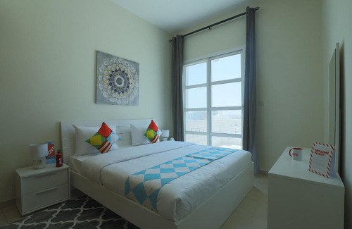 Dubai Production City Apartment | OYO 318 Home Qasr Sabah 3