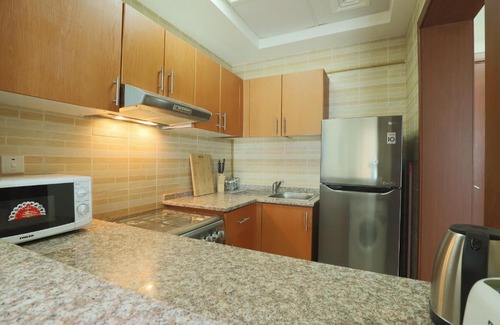 Dubai Production City Apartment | OYO Home 256 1BHK Qasr Sabah 3 IMPZ