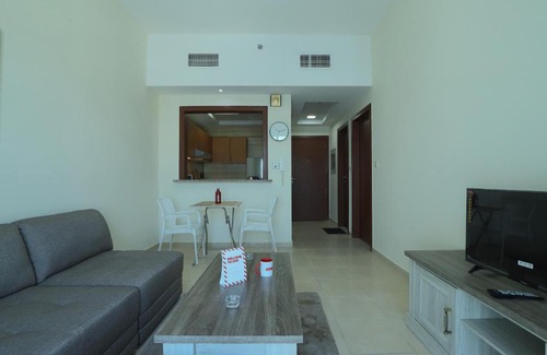 Dubai Production City Apartment | OYO Home 256 1BHK Qasr Sabah 3 IMPZ