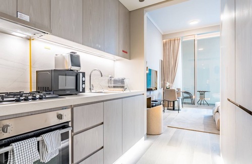 Jumeirah Village Circle Apartment | Pool View Studio with Balcony Close to Mall, Concept 7 Residences