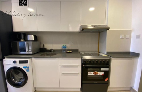 Jumeirah Village Circle Apartment | Serviced Studio in Bloom Heights by Mira Holiday Homes