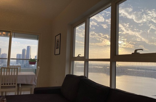 Al Majaz Apartment | amazing beach view , 5 star full furnished