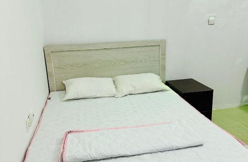 Sharjah Apartment | Big bedroom in apartment sharing washroom