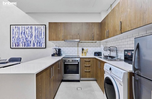 Jumeirah Village Circle Apartment | bnbme | Stylish JVC Apartment | Pool & Private Patio