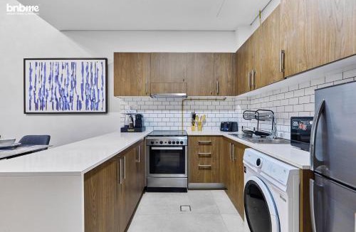 Jumeirah Village Circle Apartment | bnbmehomes - Casa Grande
