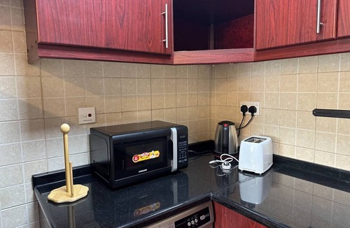 Discovery Gardens Condo | Bright renovated 1 Bedroom Next to Metro Mallnn