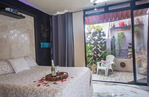 Chuburna Puerto Cottage | Cascada suite. Private Waterfall Pool & Cinema Screen I Beachfront Sanctuary