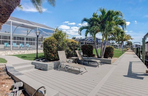 Yacht Club House | Charming 3 bed 2 bath. Heated pool. Canal front. Walk to the beach !
