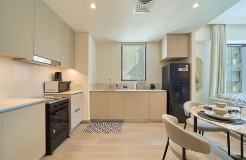 Dubai Apartment | Chic & Sunny 1BR Escape | Grove Creek Beach Access