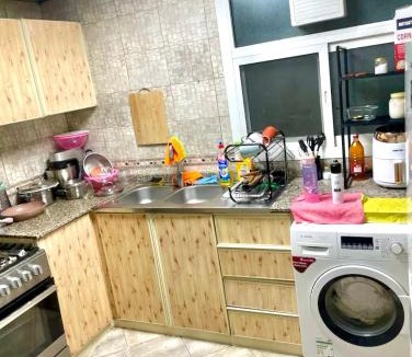 Al Nahda Apartment | Comfortable Apartment Bedroom And Spacious Living Room Family and Couple