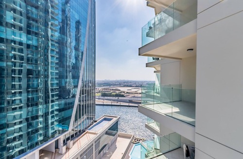 Business Bay Apartment | Contemporary 1BR w/Partial Canal Views, Business Bay by Deluxe Holiday Homes