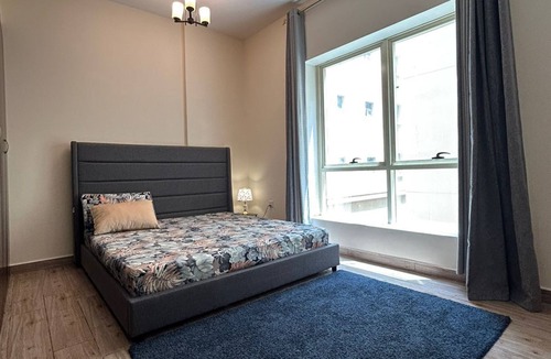 Sharjah Apartment | Cozy 2-bedroom apartment in charming Sharjah with AC