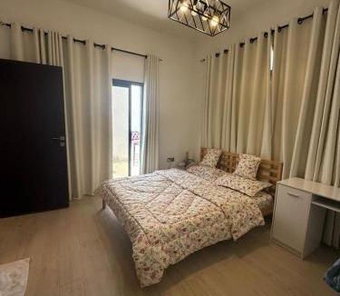 Ajman House | Cozy Peaceful Single Room with Balcony and Attached Washroom