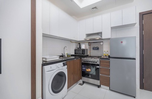 International City Apartment | Cozy Studio Apartment with Pool View in International City