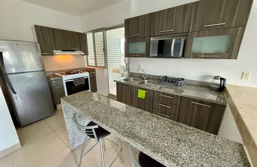 Downtown Cancun Apartment | Deluxe 2 Bed 2 Bath Condo with a (Large outdoor Pool/Hot Tub)