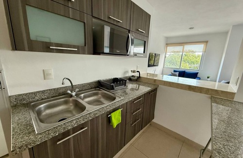 Downtown Cancun Apartment | Deluxe 2 Bed 2 Bath Condo with a (Large outdoor Pool/Hot Tub)
