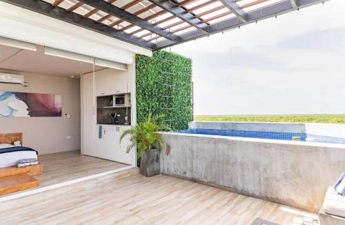 Ek Balam Village Apartment | Designer Penthouse - Rooftop Pool & Jungle View