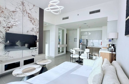 Jadaf Apartment | Elegant Downtown Escape 1BR w/Balcony, Pool & GYM
