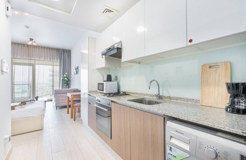 Jadaf Apartment | Elegant Home in Al Jaddaf with Roof Top Pool