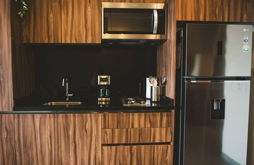 Cuauhtemoc Apartment | Fully equipped kitchen, high speed internet, comfy queen-size bed and a small sofa bed.