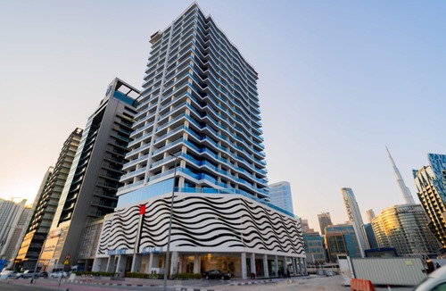 Business Bay Apartment | Kasco Homes - Waves Tower by the Canal Business Bay