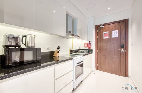 Dubai Apartment | Luxuriant Studio at Golf Promenade 2A DAMAC Hills by Deluxe Holiday Homes