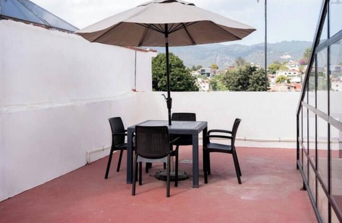 De Guadalupe Apartment | Modern Renovated Loft: Experience the Urban Heart