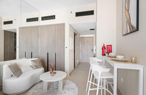 Dubai Apartment | Modern Studio in residence with pool gym and paddl