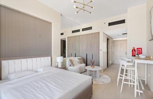 Dubai Apartment | Modern Studio in residence with pool gym and paddl
