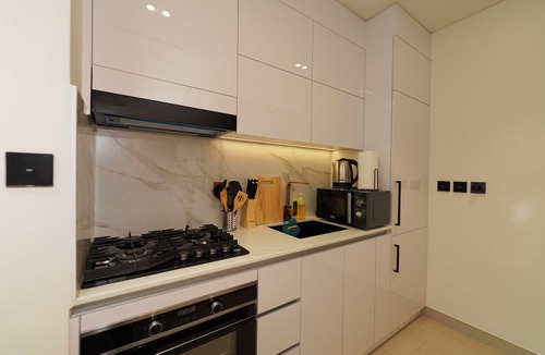 Jumeirah Village Circle Apartment | Modern Studio with Balcony Views of FIVE Hotels