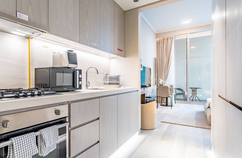 Jumeirah Village Circle Apartment | Pool View Studio with Balcony Close to Mall, Concept 7 Residences