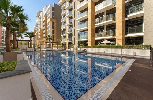 Nad Al Sheba Apartment | Premium Studio in Azizi Riviera