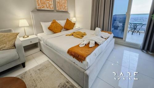 Dubai Sports City Apartment | Rare Holiday Homes - Dubai Sports City - Elite Residence - R1303