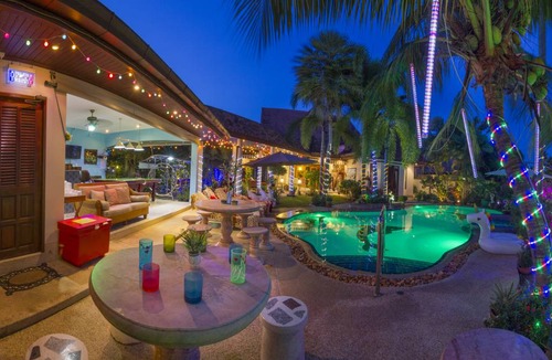 Nong Pla Lai Villa | Relaxing Palm Pool Villa & Tropical Illuminated Garden & Swimming Pool.