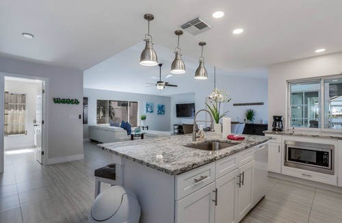 Eight Lakes House | Remodeled waterfront home with pool, lanai, private dock, & WiFi - snowbirds OK