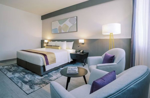 Al Muraqqabat Hotel | Rooftop Views & Attractions | Steps to Dubai Mall, Burj Khalifa & Iconic Sights